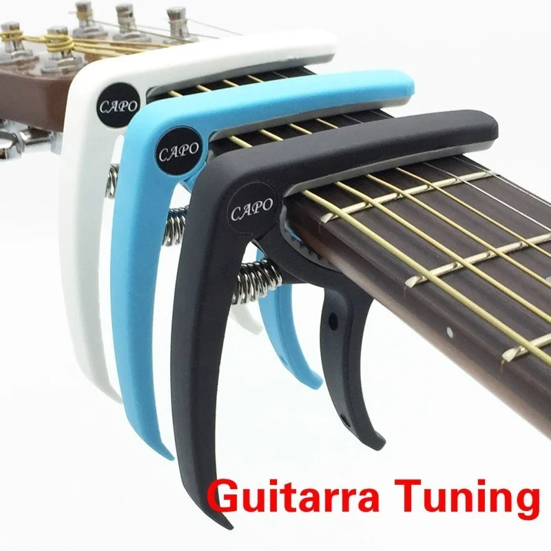 Capotasto per chitarra in plas - Musical Instrument Strings recensione e prezzo